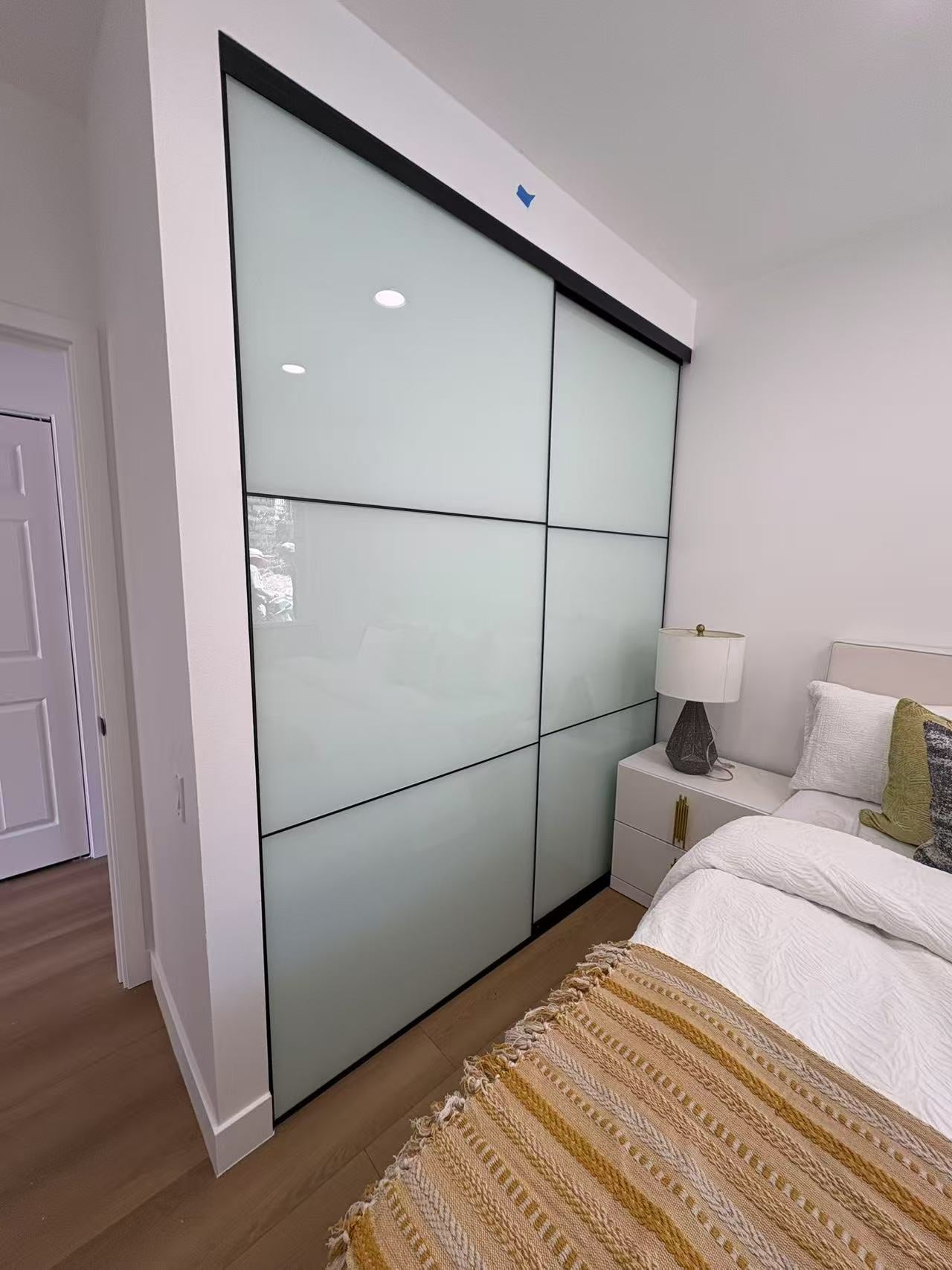 VUE | Tri-Grid White Glass Sliding Closet Doors