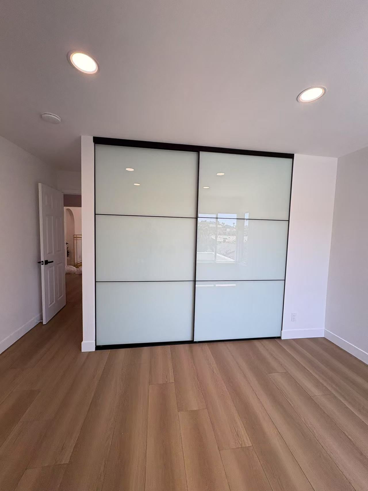 VUE | Tri-Grid White Glass Sliding Closet Doors