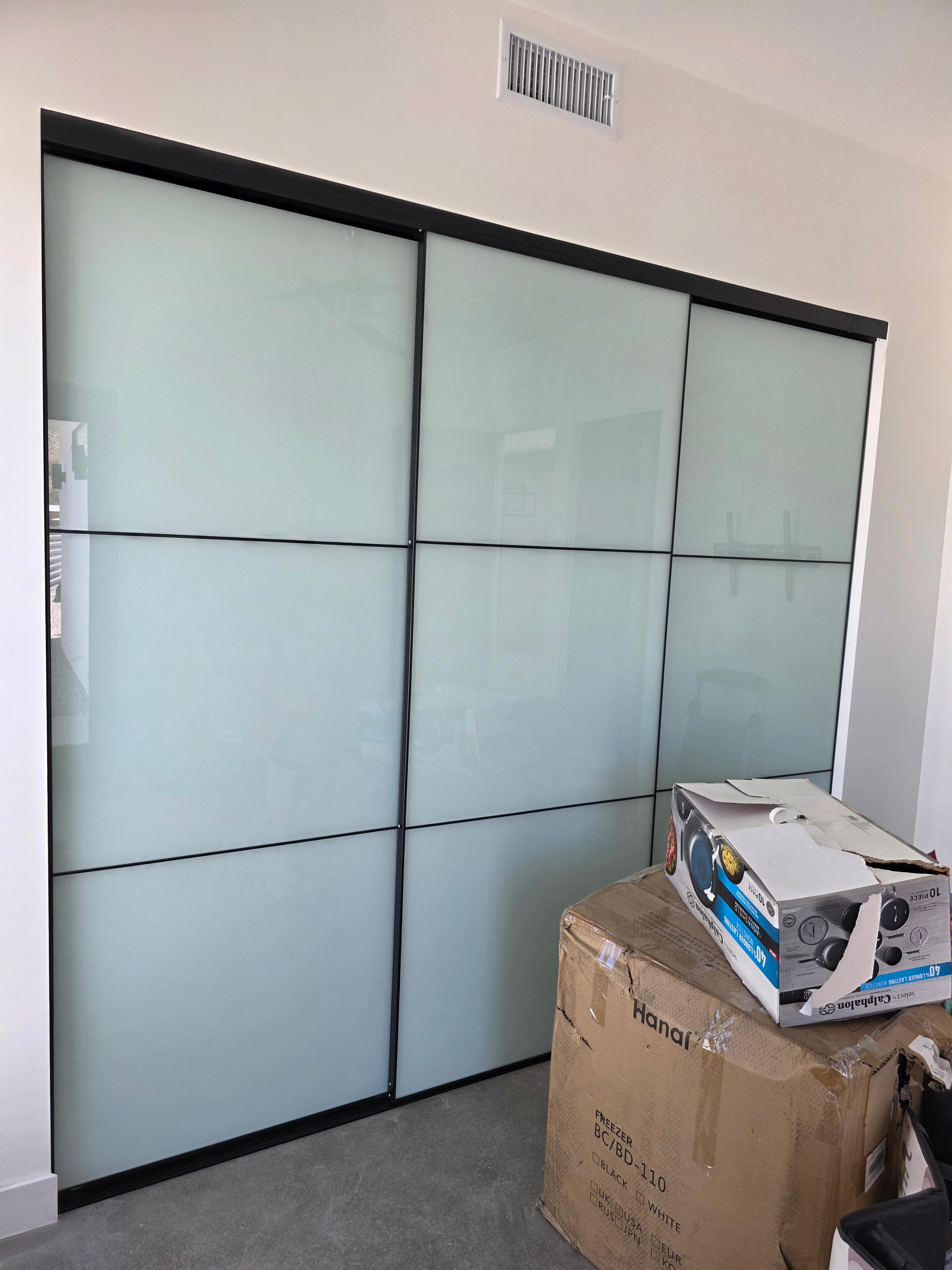 VUE | Tri-Grid White Glass Sliding Closet Doors